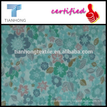 colorful flower and leaf print on 100 cotton dobby fabric in light weight for dress